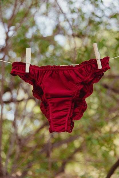 The burgundy frilly panties