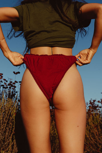 The burgundy frilly panties