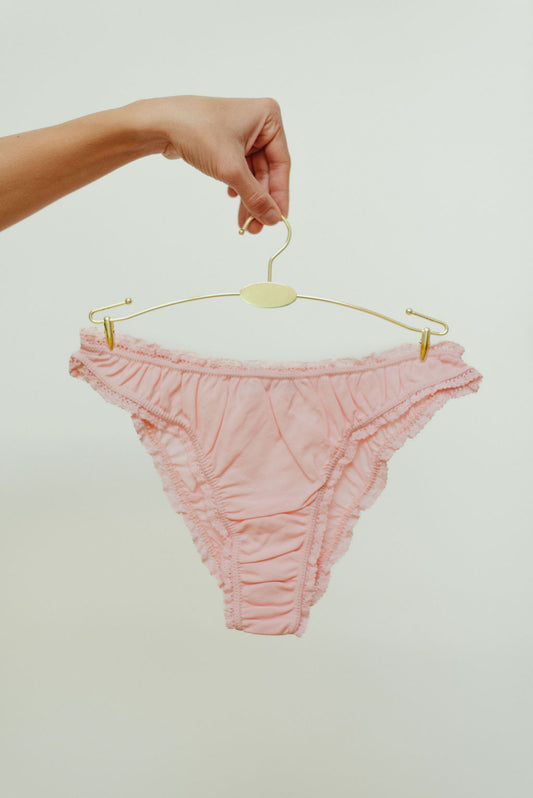 The powder pink frilly panties